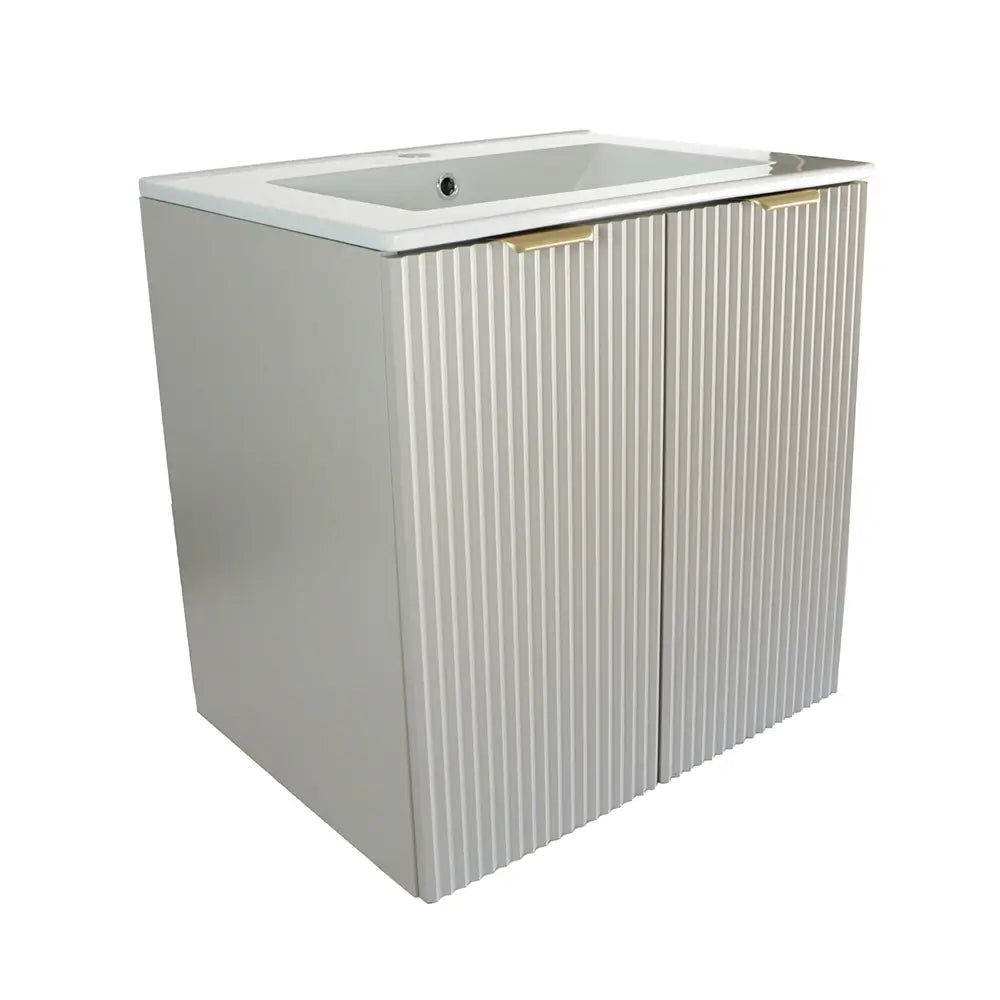 Waschtischunterschrank 60 cm in Kaschmir mit gerillten Türen, eingelassenem Keramikwaschbecken und Metallgriffen in Schwarz oder Gold.